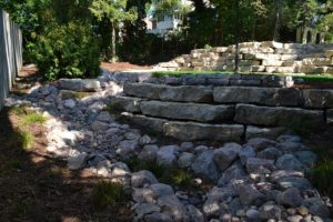 Limestone Retaining Wall & Cobble Spillway